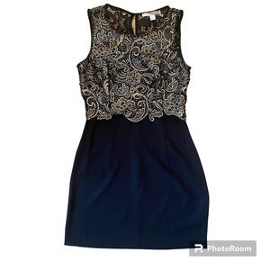 Black womans formal dress with gold lace